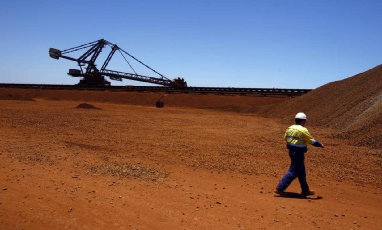 BHP's boss faces $11bn dilemma as prices languish